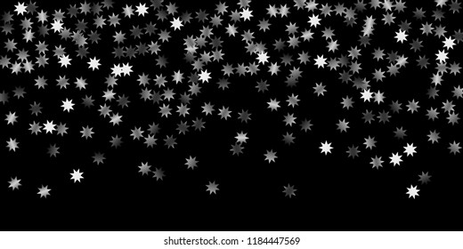 Abstract silver star of confetti. Falling starry background. Random stars shine on a black background. The dark sky with shining stars.  Suitable for your design, cards, invitations, gifts. 