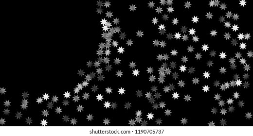 Abstract silver star of confetti. Falling starry background. Random stars shine on a black background. The dark sky with shining stars.  Suitable for your design, cards, invitations, gifts. 