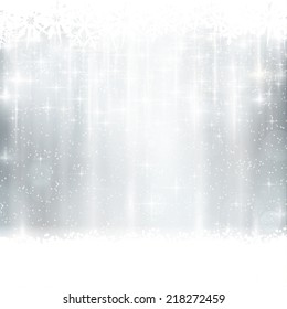 Abstract silver, white festive background with out of focus light dots, stars and  snowflakes. Great for the festive season of Christmas or any winter design to come.
