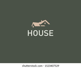 Abstract simple logo sign two roofs of houses for a construction company