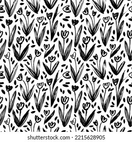 Abstract simple tulips seamless pattern. Brush drawn vector tulips with leaves. Sketchy style floral silhouettes ornament. Childish drawing of spring flowers. Black and white illustration.