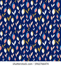 Abstract small flowers on dark blue seamless botanical pattern. Multicolored spring and summer plants with blossom. Wildflowers on repeating background for prints, textile and fabric designs.