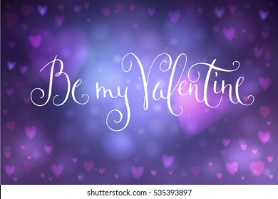 Abstract smooth blur blue background with heart-shaped lights over it and hand written Valentine's day greetings.