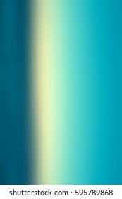 Abstract smooth blur blue background for any design to put over. Vertical format.