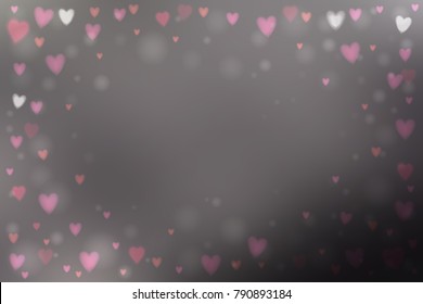 Abstract smooth blur gray background with small heart-shaped lights over it.
