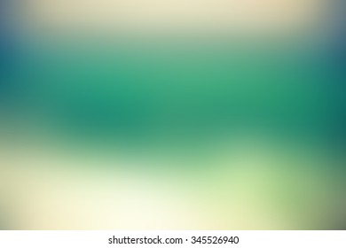 Abstract smooth blur green background for any design to put over.