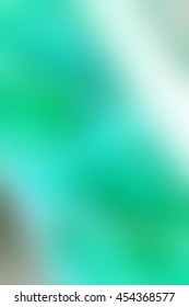 Abstract smooth blur green background for any design to put over. Vertical format.