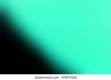 Abstract smooth blur green and black background for any design to put over.