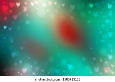 Abstract smooth blur green and red background with small heart-shaped lights over it.