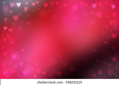 Abstract smooth blur pink background with small heart-shaped lights over it.