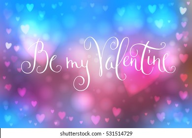 Abstract smooth blur pink and blue background with heart-shaped lights over it and hand written Valentine's day greetings.