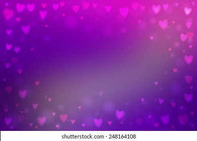 Abstract smooth blur purple-pink background with small heart-shaped lights over it.