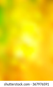 Abstract smooth blur yellow background for any design to put over. Vertical format.