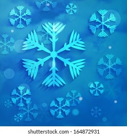 abstract snowflakes on blue clouds background