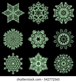 Abstract snowflakes set. Vector snowflakes with watercolor effect. Textile print for bed linen, jacket, package design, fabric and fashion concepts.
