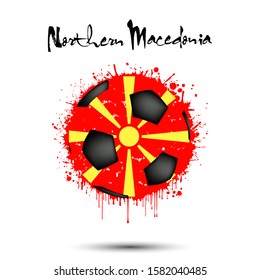 Abstract soccer ball painted in the colors of the Northern Macedonia flag. Flag of Macedonia in the form of a soccer ball made of blots on an isolated background. Grunge style. Vector illustration