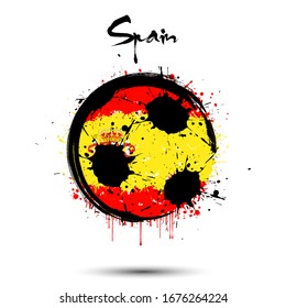 Abstract soccer ball painted in the colors of the Spain flag. Flag of Spain in the form of a soccer ball made of blots on an isolated background. Design pattern in grunge style. Vector illustration