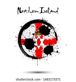Abstract soccer ball painted in the colors of the Northern Ireland flag. Flag of Northern Ireland in the form of a soccer ball made of blots on an isolated background. Vector illustration