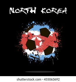 Abstract soccer ball painted in the colors of the North Korea flag. Vector illustration 