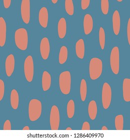 Abstract spot shapes seamless vector pattern. Red marks on blue background. Modern strokes design for fabric, packaging, digital paper, web banner, page fill, wrapping, covers. Contemporary design.