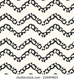 Abstract spot textured chevron background. seamless pattern. Vector.