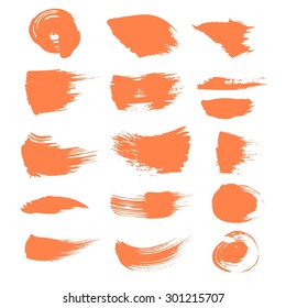 Abstract spots of orange paint  isolated on a white background 2