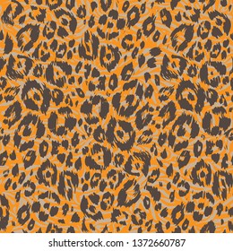 Abstract spotted textured pattern. Bright animal skin. Leopard seamless print.