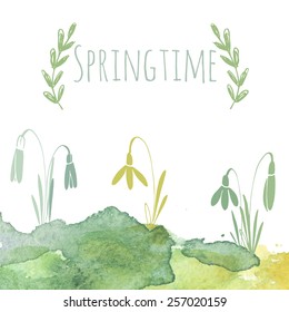 Abstract spring green watercolor background with snowdrops and inscription