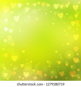 Abstract square blur green background with small heart-shaped lights over it.