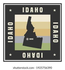 Abstract square stamp or sign with silhouette and name of US state Idaho, vector illustration