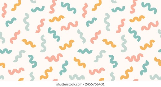 Abstract squiggle shapes geometric seamless pattern. Scattered textured wavy ribbon lines background in pastel colors. Simple confetti party streamers in muted rainbow palette textile wallpaper print.