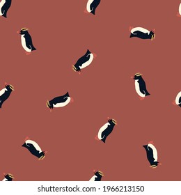 Abstract style wildlife seamless pattern with doodle crested penguins silhouettes. Maroon pale background. Designed for fabric design, textile print, wrapping, cover. Vector illustration.