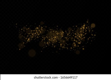 Abstract stylish light effect on a black transparent background. Yellow dust yellow sparks and golden stars shine with special light.Christmas