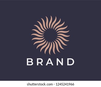 Abstract sun logo design concept. Luxury and elegant style.