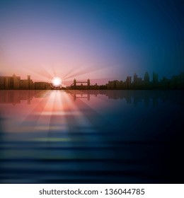 abstract sunrise background with silhouette of London