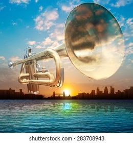 abstract sunrise background with silhouette of London and trumpet