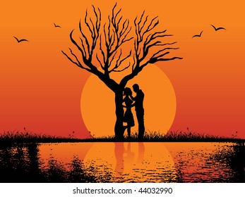 abstract sunset background with dry tree, couple