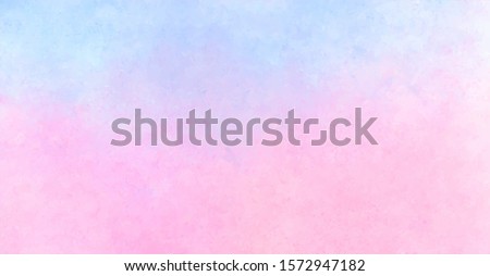 Delicate light lilac-pale blue tangle of dried flowers in front of a plastered wall