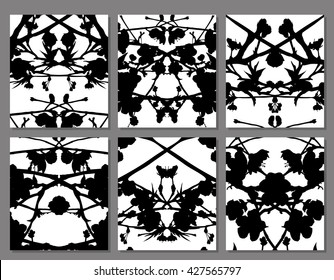 Abstract symmetrical black stains on a white background, set