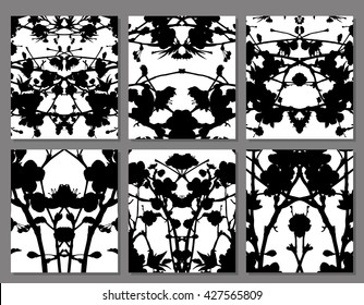 Abstract symmetrical black stains on a white background, set