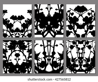 Abstract symmetrical black stains on a white background, set