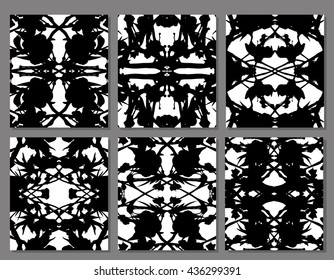 Abstract symmetrical black stains on a white background, set