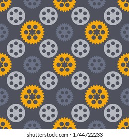Abstract techno geometrical ditsy seamless pattern with gear wheels texture icon silhouette style elements.Yellow grey colors on dark background for surface design wrapping textile cover
