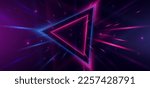 Abstract technology futuristic neon triangle glowing blue and pink  light lines with speed motion blur effect on dark blue background. Vector illustration