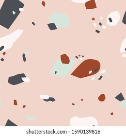 Abstract terrazzo seamless pattern on a light background. Realistic marble texture with stone fragments. Modern minimalist backdrop for floor and tile design. Trendy vector illustration