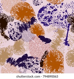 Abstract textile print with dots and textured elements. Colorful fabric swatch. 