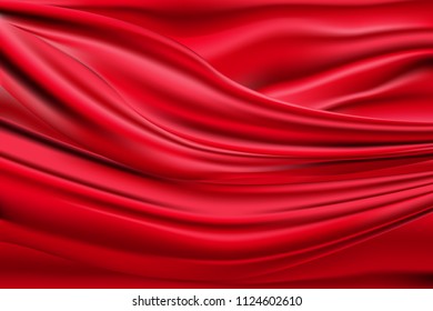Abstract texture of a red satin fabric. Artistic background. Silk surface