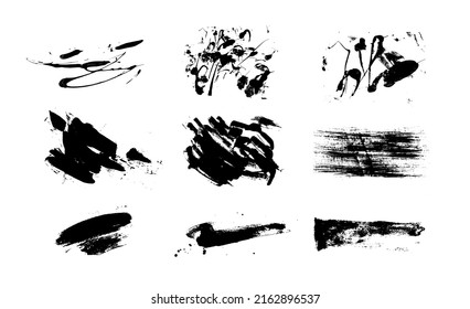 Abstract texture spots with a brush. Black on white isolated. Set of elements for design.