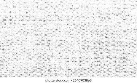 Abstract textured background in black and white showing a dot pattern simulating a canvas structure suitable for diverse design applications.