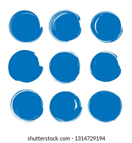 Abstract textured blue round strokes of thick paint isolated on white background